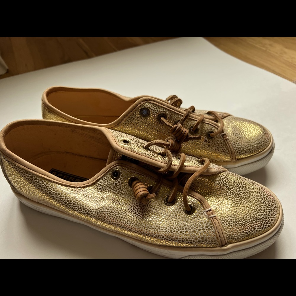 Gold Sperry shoes